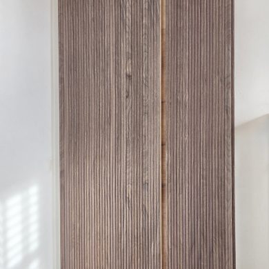 02-fluted-timber-wall-cladding-seamless-bedroom-joinery_