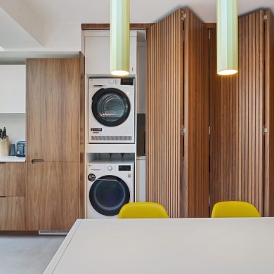 08-integrated-laundry-cupboard-oak slatted full height sliders-appliances-space-saving